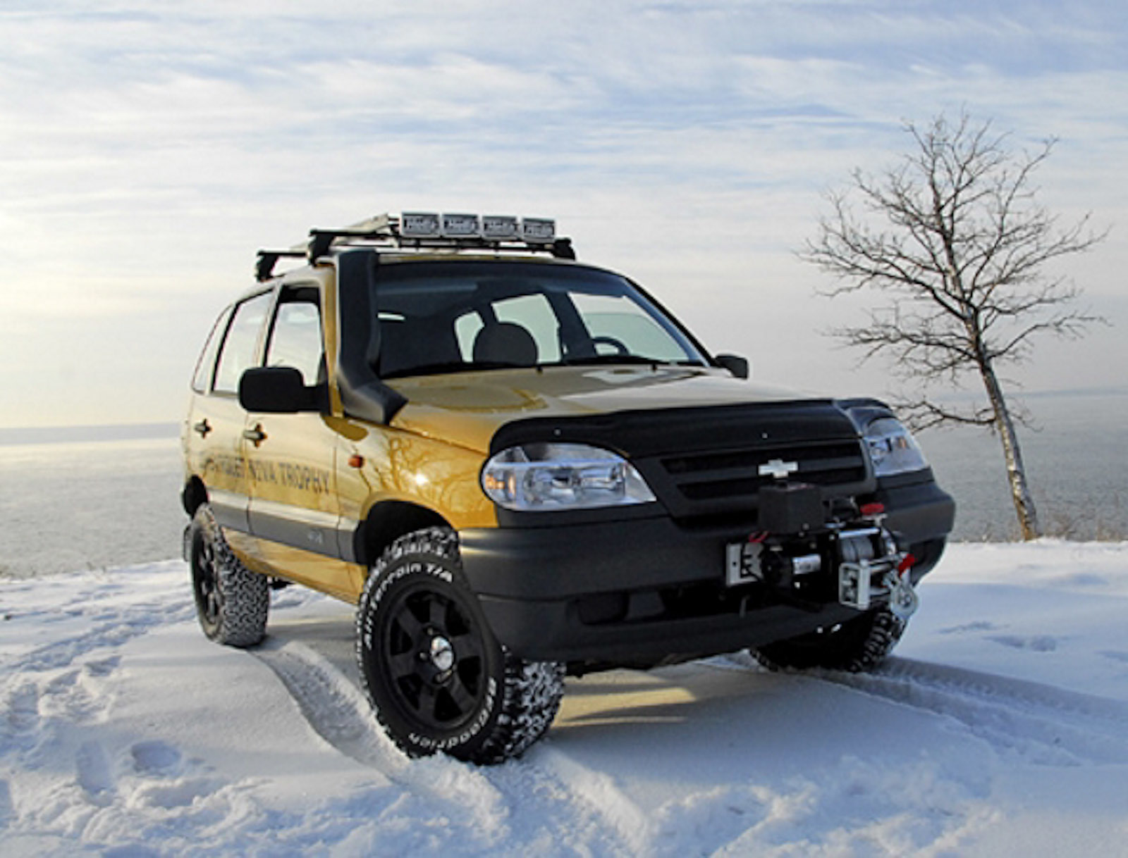 Нива шевроле усиленная. Chevrolet Niva трофи. Chevrolet Niva Trophy (Шевроле Нива трофи). Chevrolet Niva Tuning. Внедорожный обвес Шевроле Нива.